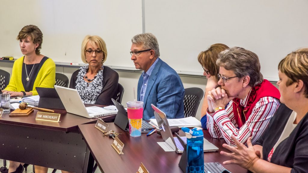 Okanagan Falls trustee Sam Hancheroff speaks in support of closing Osoyoos Secondary School. The former NDP provincial candidate blamed funding from the B.C. Liberal government. (Richard McGuire photo)