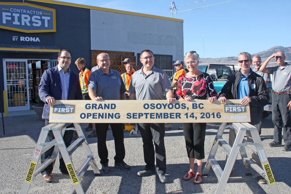 The Contractors First by Rona outlet in Osoyoos held its official grand opening Wednesday morning. As has become company tradition, the new owners cut a wooden board instead of a ribbon. On hand for the grand opening were, from left, Rona’s regional director of operations Dale Girard, assistant manager Tim Collingwood, co-owner Chad Mielke, Osoyoos Mayor Sue McKortoff and town councillor Mike Campol. (Keith Lacey photo) 