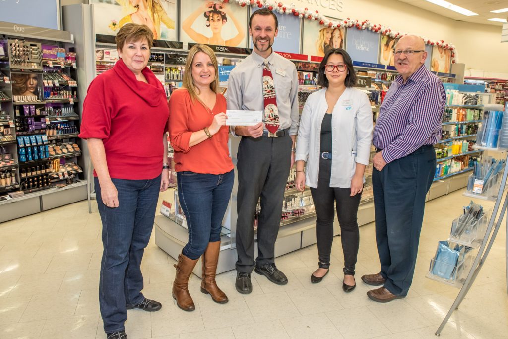 Shoppers Drug Mart in Osoyoos once again raised money for Desert Valley Hospice Society (DVH) this year under its Growing Women’s Health campaign, formerly Tree of Life. Steven Hopp, pharmacist and owner, and Daisy Li, pharmacist and in-store captain for the program, handed over a cheque for $4,289 last week. The four-week campaign ran from mid-September to mid-October and customers contributed by purchasing “icons” at checkout representing such things as leaves and butterflies. Hopp said all the money raised goes to the charity selected by the store and there is no administrative fee. About $500 was also raised at a barbecue in October. The funds raised will help to support volunteer programs at the hospice society. From left are: Pat Wycherley, a director with DVH; Tracy MacFadden, executive director with DVH; Hopp, Li; and Ted Cronmiller, a director with DVH. DVH trains and educates volunteers to provide end-of-life care to patients in residential care, at home or in hospital, as well as support for their families. (Richard McGuire photo)