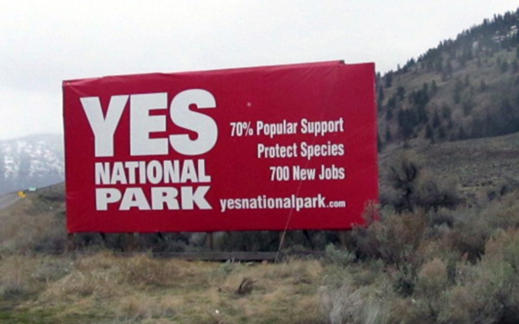 The South Okanagan Similkameen National Park Network erected this sign near the intersection of Hwy 3 and Nighthawk Rd. on Thursday, March 16. During the night of Saturday, March 18 to Sunday March 19, it was cut down with chainsaws and slashed up. (Contributed photo)