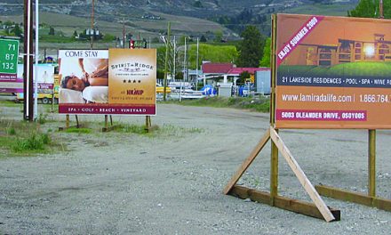 TOWN NOW ENFORCING NEW TRAFFIC BYLAW WHICH DEALS WITH UNSIGHTLY, HAZARDOUS SIGNS