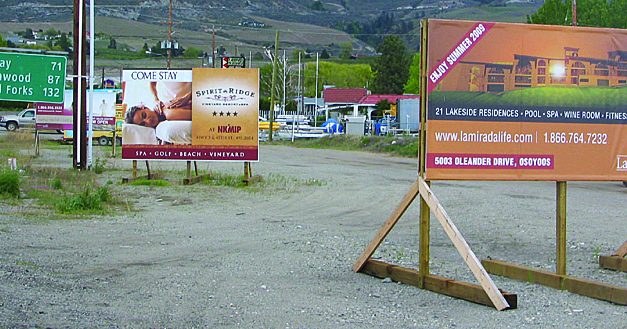 TOWN NOW ENFORCING NEW TRAFFIC BYLAW WHICH DEALS WITH UNSIGHTLY, HAZARDOUS SIGNS