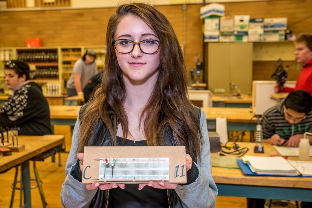 Shy-Anne Piche took the gold in the electronics skills competition in Kelowna and she'll be going to the provincials in Abbotsford. Here she shows a circuit board she had to put together that flashes green and red LED lights. (Richard McGuire photo)