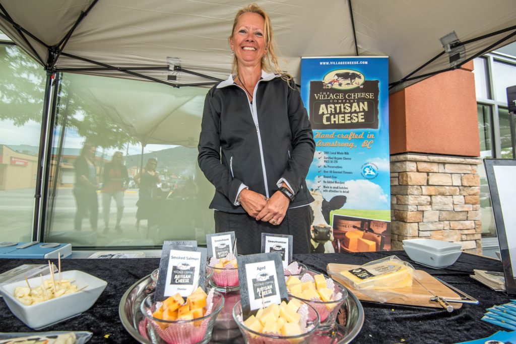 Slow food is the opposite of fast food -- it uses handcrafted, organic and generally wholesome ingredients. For the fourth year in a row on Sunday, slow food vendors held a market in front of the Watermark Beach Resort. Pictured here, Sonja Davyduke, of the Village Cheese Company in Armstrong, was offering samples of her hand-crafted cheeses. The Annual Market of Taste by Slow Food Thompson Okanagan was held in conjunction with the Devour! Food Film Festival, which is making a cross-country stopover in the Okanagan Wine Country this year. (Richard McGuire photo)