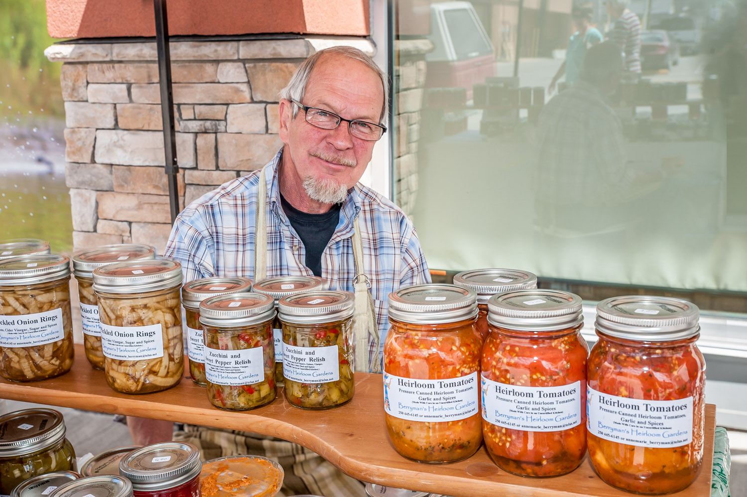 Jeff Berryman was selling preserves from heirloom varieties of tomatoes, peppers, onions and other vegetables at the Market of Taste on Sunday. He and his wife Annemarie have a greenhouse and garden above Greenwood where they grow their produce. The market was part of Slow Food Thompson Okanagan's foodie extravaganza at the Watermark Beach Resort. (Richard McGuire photo)