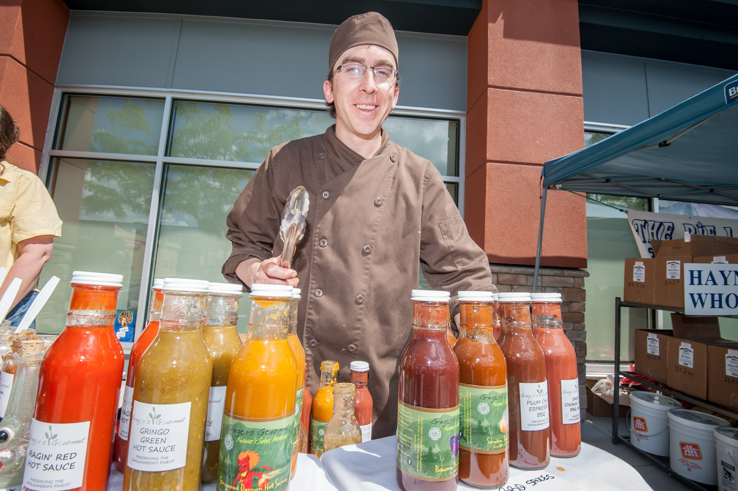 Gregory Fuchs, a chef from Keremeos, was offering samples from his selection of sauces ranging from mild to hot. They're made with organic ingredients he grows himself. Fuchs had a booth at Market of Taste, which was part of Slow Food Thompson Okanagan's foodie extravaganza event at the Watermark Beach Resort on Sunday. (Richard McGuire photo)