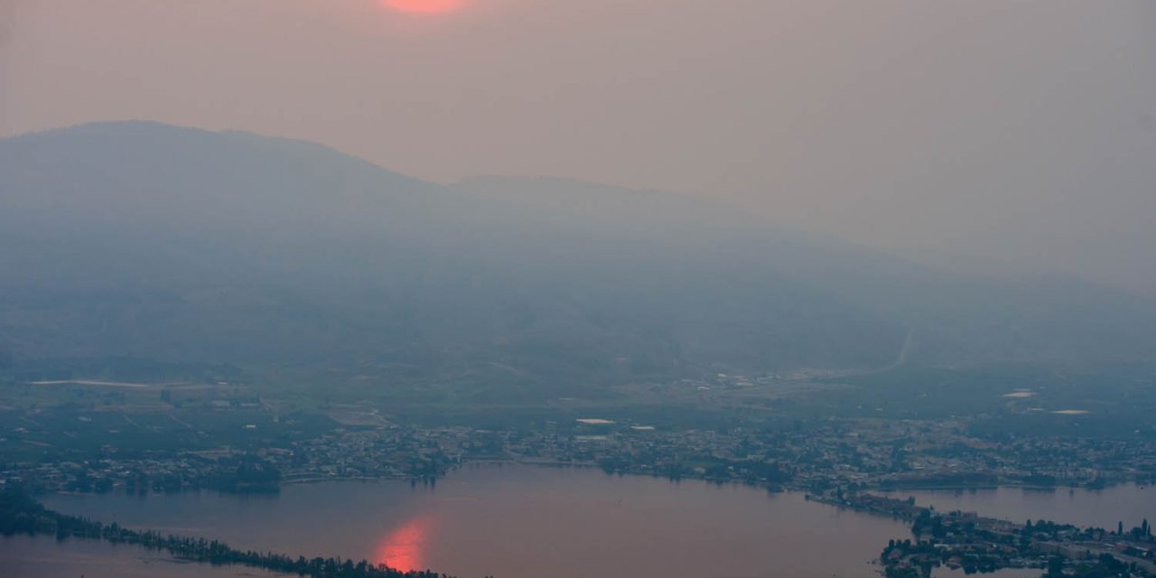 Wildfire smoke advisory in effect as fires burn on both sides of the border