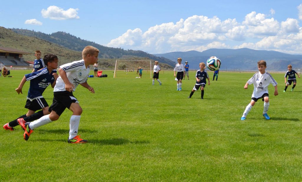 Players race to keep the ball in play. (Trevor Nichols photo)