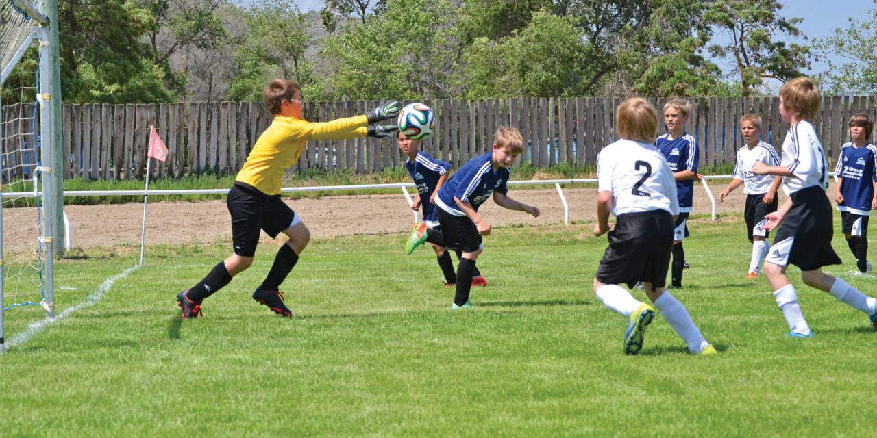 U-11 boys shine in summer heat