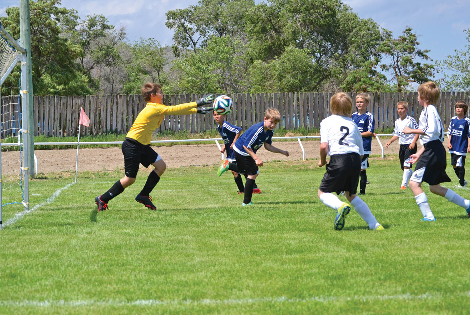 An Osoyoos shot is batted away keeping the game scoreless. Players of the U-11 boys club team were some of the youngsters lacing up their cleats on Saturday for a busy day of soccer. The season winds down soon, but players have made big improvements since the start of the season say some proud parents. (Trevor Nichols photo)