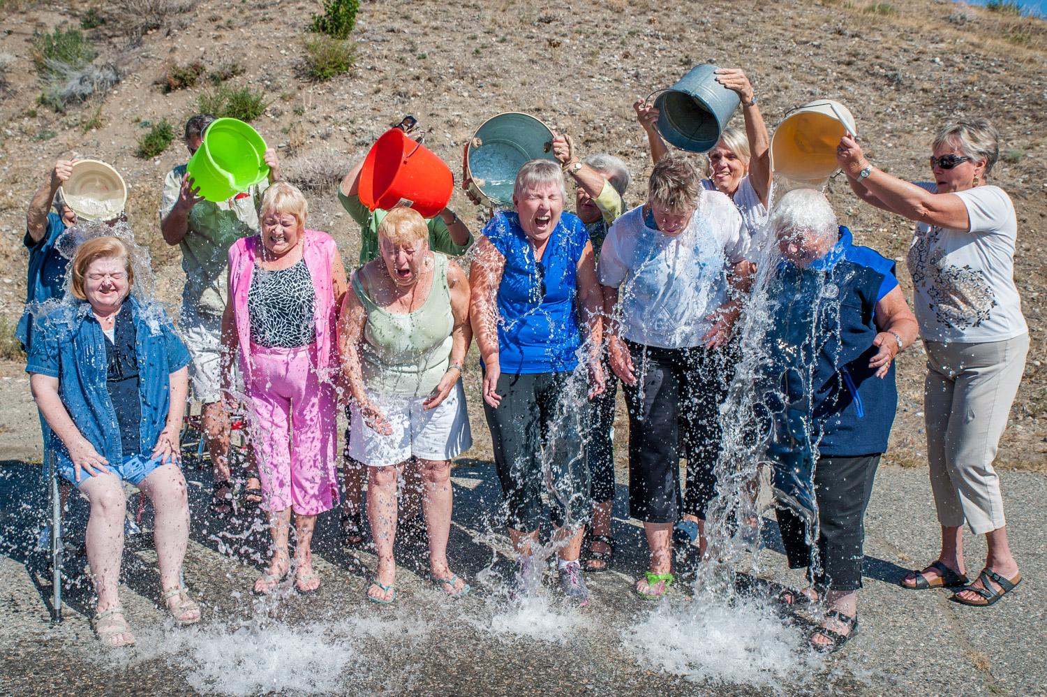 Members of the Osoyoos Soroptimist Club underwent a soaking in the ALS Ice Bucket Challenge on Saturday. They in turn challenged other Soroptimist clubs around the world. (Richard McGuire photo)