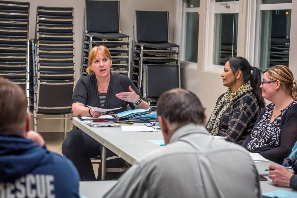 Armed with information she's gathered, Brenda Dorosz, chair of Save Our Schools (SOS), spoke to members of her group at a meeting last February. (Richard McGuire photo)