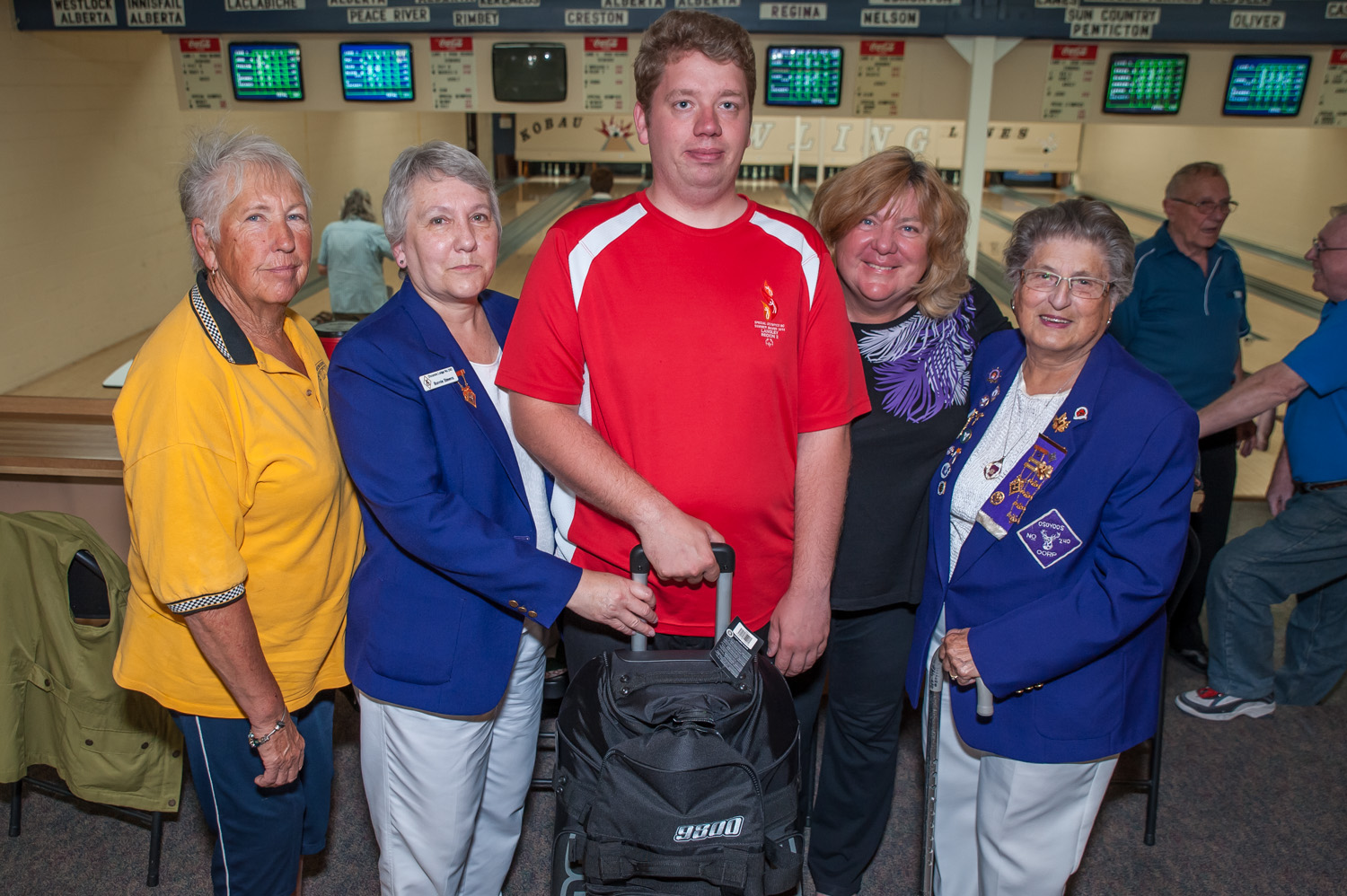 Stephen Lee, centre, is off next month to bowl at the national Special Olympics where he will be on the team representing B.C. He is shown with members of Royal Purple, who contributed to travel bags for local special Olympians. From left are Ingrid Nicholson, Bonnie Stevens (Royal Purple president), Lee, Mellhina Thibault and Anne Stappler. (Richard McGuire photo)