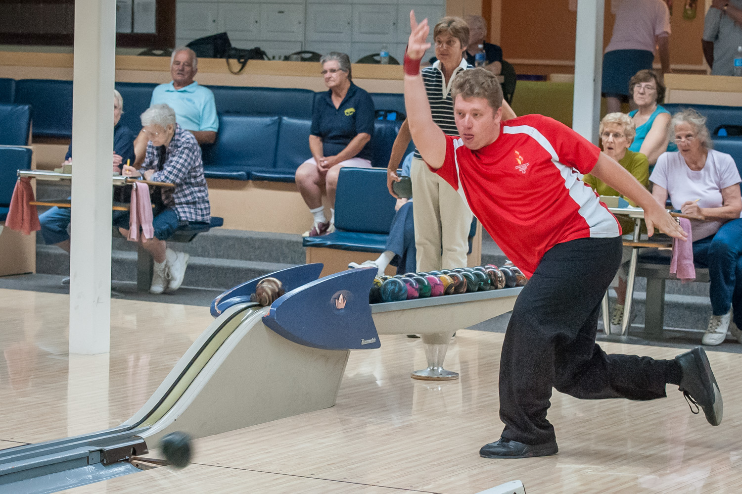 Stephen Lee releases his ball at Kobau Lanes. In July he travels to Richmond to compete for the B.C. team in the national Special Olympics. (Richard McGuire photo)