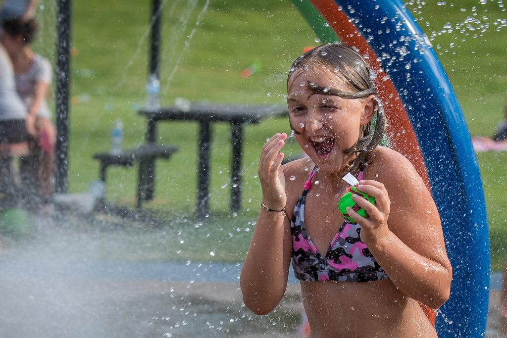 MaKenna Pederson, 10, of Osoyoos cooled off on a hot day last Wednesday at the Osoyoos Splash Park. The occasion was "Family Splash Day," and event organized by the town with refreshments provided by AG Foods. (Richard McGuire photo)