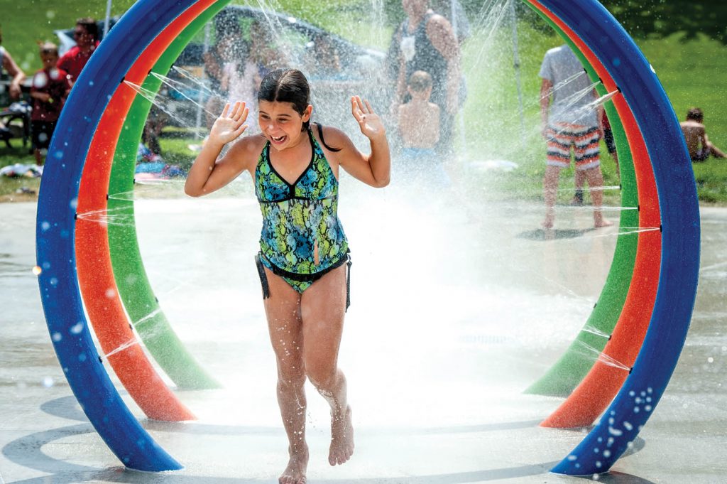 A boy takes aim with a water cannon as the Osoyoos Splash Park officially opened June 6. (Richard McGuire photo)