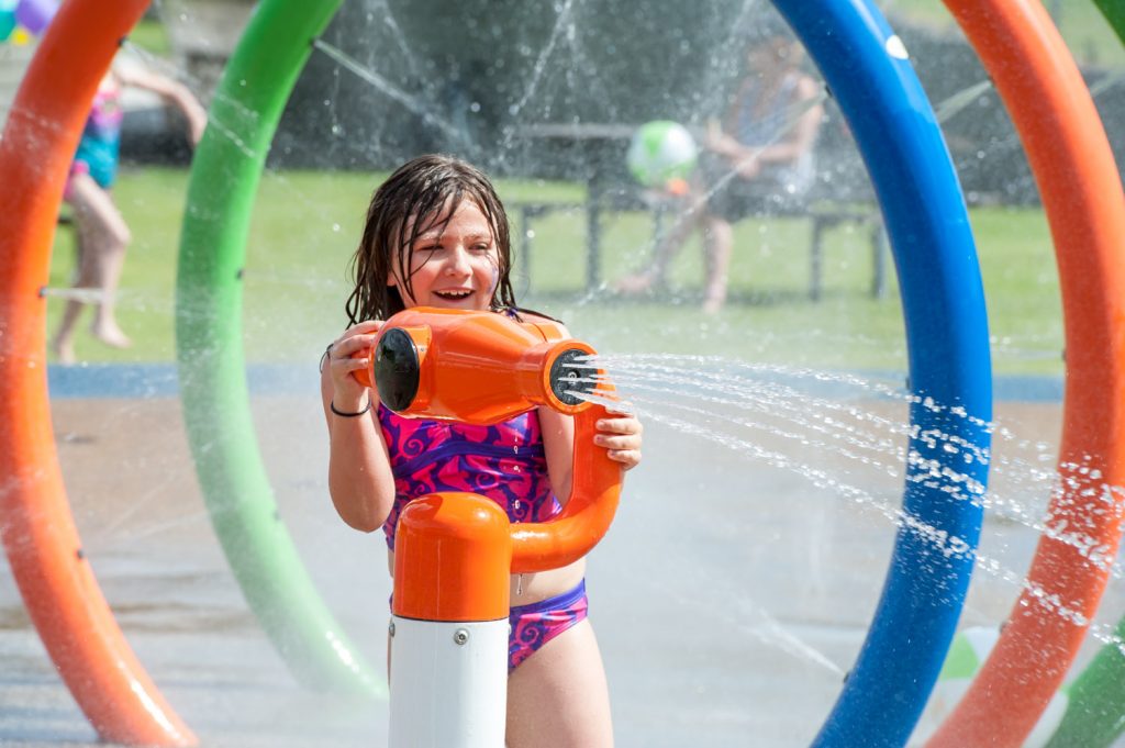 Hali Steiner, 8, takes aim with a water cannon at the Osoyoos Splash Park, which held its official opening on Friday, June 6. (Richard McGuire photo)