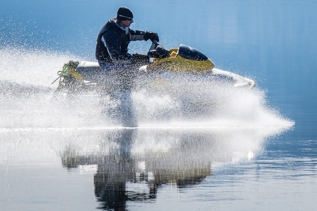 A personal watercraft skims over Osoyoos Lake, an early harbinger of the coming summer season. (Richard McGuire photo)