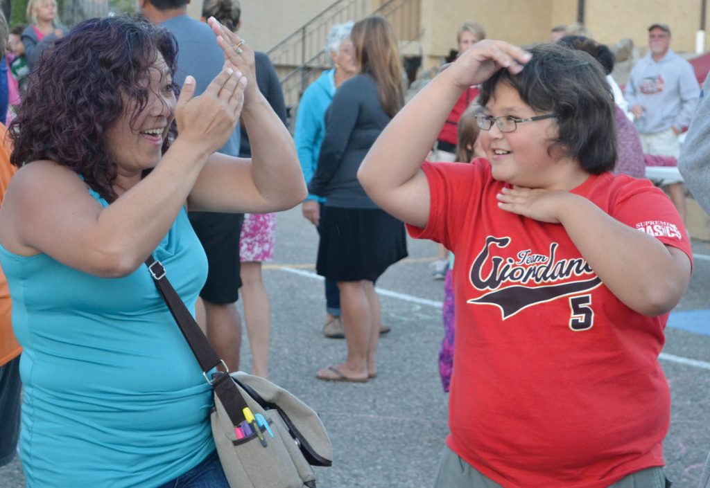 Ty Shackleton and his mom Yuri show off their space work. (Trevor Nichols photo)