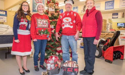 Sears winning ugly sweaters looked very familiar to mayor