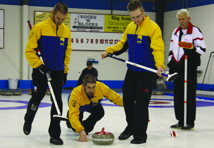 teamfranceweb Team France members (from left) Raphael Mathieu and brothers Jan and Richard Ducroz send a rock down the ice at the Osoyoos International Curling Club on Jan. 16 as an opponent from Osoyoos’s Team Abrey looks on. Photo by Paul Everest - Click on picture for larger image