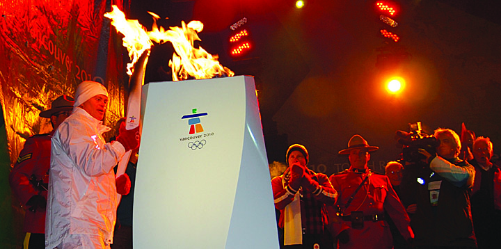 tonytorchweb Tony Batista, Osoyoos’s multiple-medal winning Special Olympian, won the hearts of the more than 2,000 people who came out to Gyro Beach on Jan. 24 to celebrate the Olympic Torch’s arrival in Osoyoos when he lit the Olympic cauldron and gave emotional thanks to the community, his family and event organizers for granting him the honour of helping to bring the Olympic flame into his home town. Photo by Laurena Weninger - Click on picture for larger image