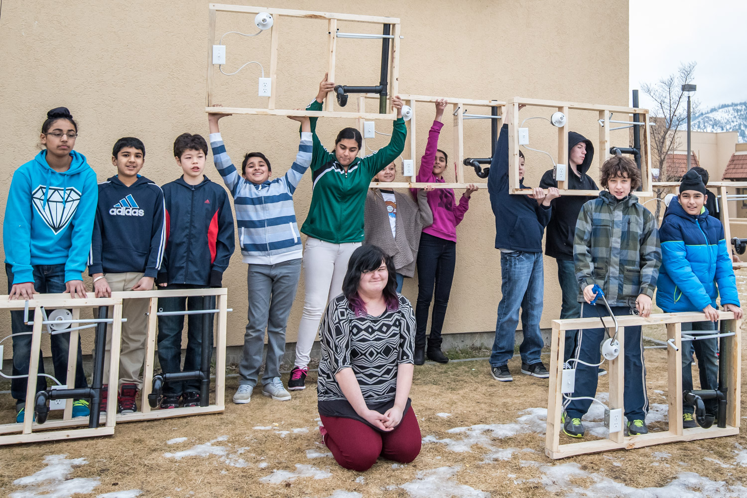 Students at Osoyoos Elementary School show off the projects they've made using framing, electrical wiring and plumbing skills. Last week the students were introduced to building trades. (Richard McGuire photo)