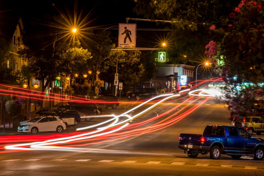 Streaks of car lights after dusk photographed with a time exposure show the Main Street traffic at crosswalks without signals. The Osoyoos Times observed a number of drivers speeding, doing U-turns and appearing to be texting. (Richard McGuire photo)