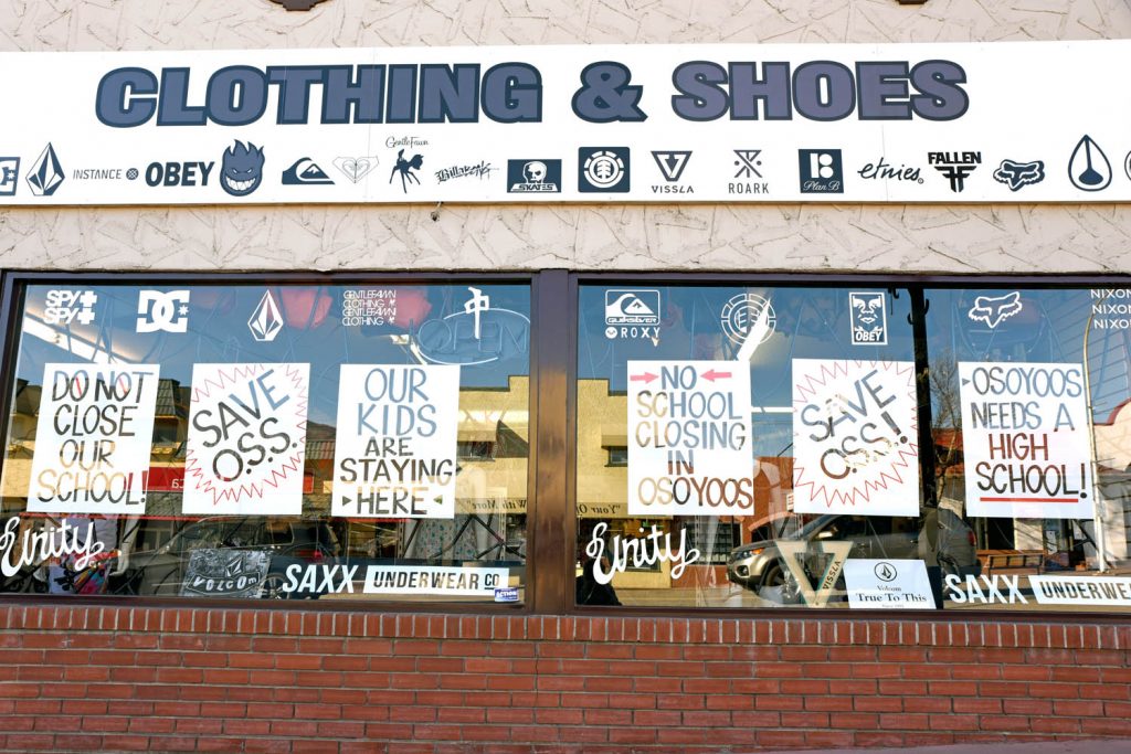 Many Osoyoos businesses have put posters in their windows to support keeping a high school in Osoyoos, but Unity Clothing has gone all out with posters in its windows. Some businesses are closing for an hour today in support of Osoyoos Secondary School and a pro-school rally takes place at OSS at 11:15 a.m. today. (Richard McGuire photo)