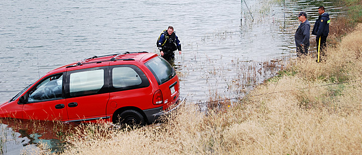 STOLEN VAN FOUND AT BOTTOM OF PEANUT LAKE