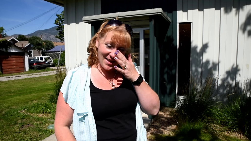 Brenda Dorosz reacts with tears of joy as trustees of School District 53 voted 5-2 to save Osoyoos Secondary School. (Richard McGuire photo)
