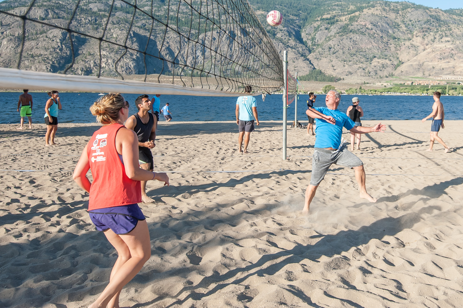 Steve Ceron (right) braces for an incoming volleyball while Michelle Fritz and Raj Toor watch from the other side of the net. This was part of the action in Wednesday evening games of Osoyoos Beach Volleyball last week at Gyro Beach. The league is in its 10th year and has 20 teams with 120 participants who play until Aug. 23. (Richard McGuire photo)