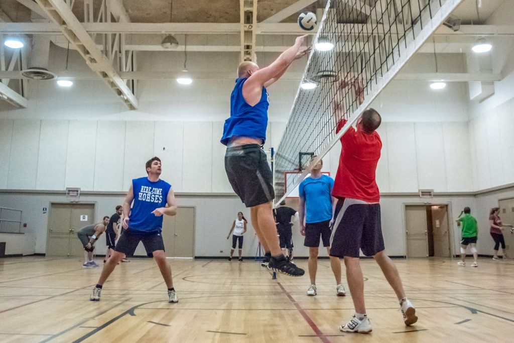Randy Houle of Here Come the Horses jumps for the ball (left) as Ryan Dunkley of Desert Hills gets ready for it. In the background Jonathan Stermescheg (left) and Kenton Gilchrist key an eye on the ball. (Richard McGuire photo)