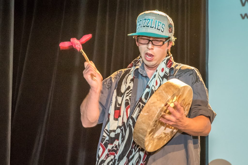 Osoyoos Indian Band member Kx Hall beats a drum at the welcoming ceremony for the Osoyoos Lake Water Science Forum at the Nk'Mip Desert Cultural Centre. (Richard McGuire photo)