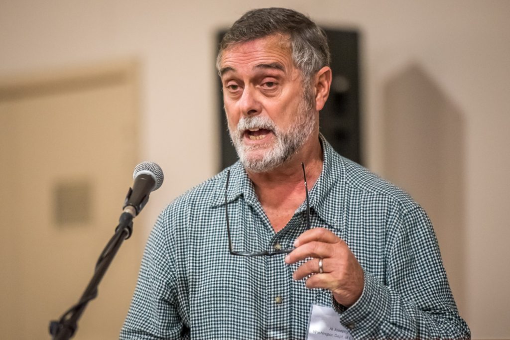 Al Josephy, of the Washington State Department of Ecology, introduces one of the discussion panels at the Osoyoos Lake Water Science Forum. Josephy oversees the operation of the Zosel Dam at Oroville, which helps to control the level of Osoyoos Lake. (Richard McGuire photo)