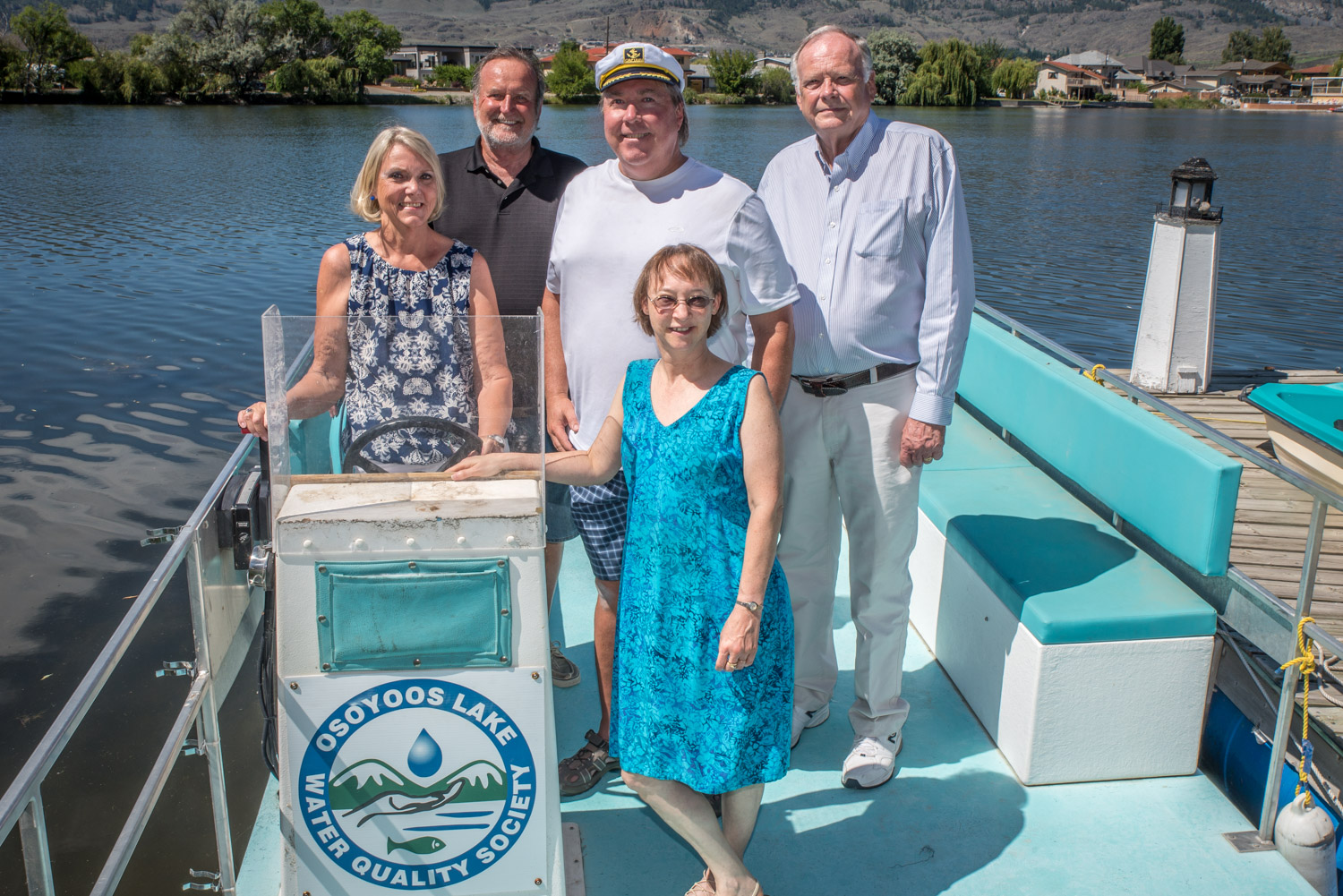 The Osoyoos Lake Water Quality Society is going through some big changes on its board. Birgit Arnstein (from left) has stepped in as president and former mayor Stu Wells, a long-time member has stepped onto the board as boat manager. Brian Faltinson steps down as president and will focus on managing the boat crew, data and website. Long-time member Denis Potter is vice president. Alicia Osland, front, has stepped down from the board after 20 years as a key player in the society. She remains a member. (Richard McGuire photo)