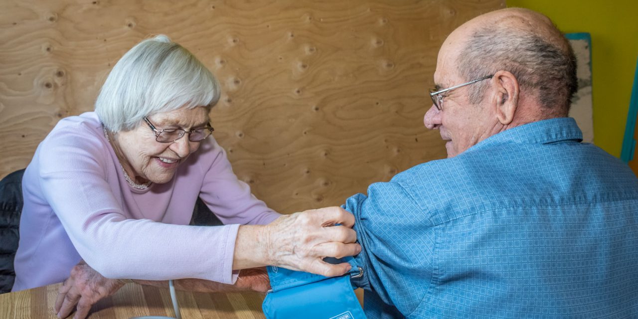 Choosing Wellness provides blood pressure test, neck massage and socializing over cookies and coffee