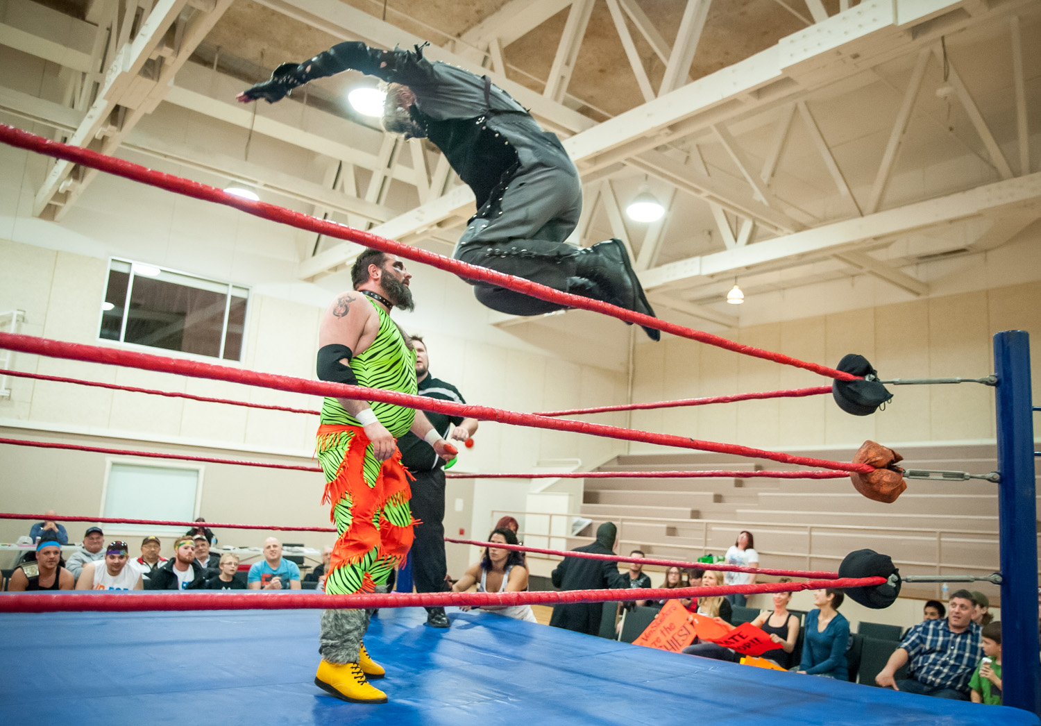 Six-foot-eight Cremator Von Slasher leaps from the ropes onto Mad Dog Marty Sugar during a performance by Big West Wrestling Sunday night at the Sonora Community Centre. Sugar went on to "win." (Richard McGuire photo)