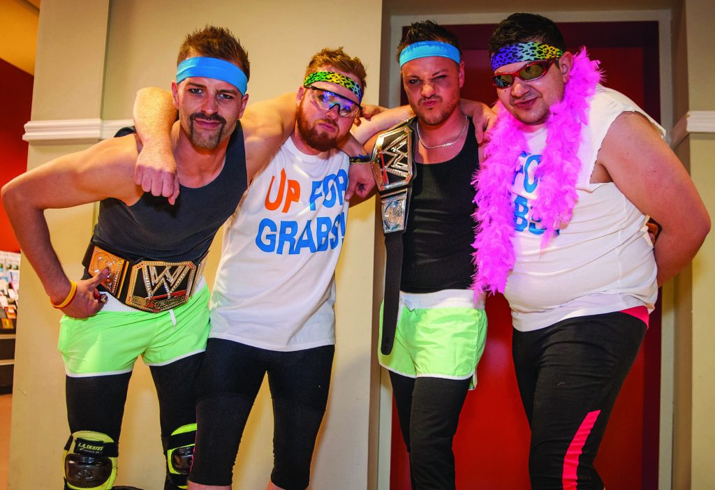 Local wrestling fans (from left) Tyler Fecyk, Keenan Currell, Dustin Currell and Blake Sewell dressed appropriately for Big West Wrestling's show Sunday night at the Sonora Community Centre.