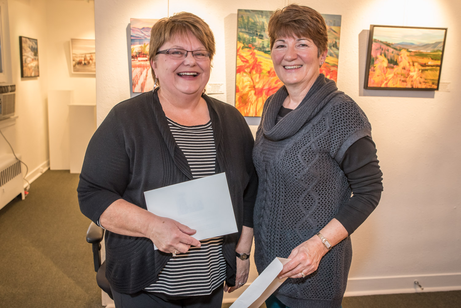 Eileen Hopkins (left) and Maxine Boxall were chosen by judges as the winners of the short story writing contest sponsored by O's Own Writers. Boxall placed first and Hopkins was second among 15 entries. Each won a prize of $100. (Richard McGuire photo)
