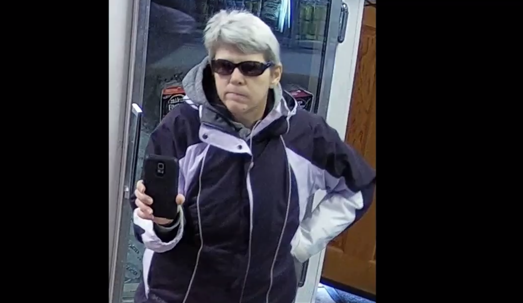 Police seeking woman who allegedly spit on liquor store employee