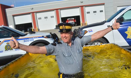Sheriffs, RCMP take the ‘polar plunge’ in Oliver