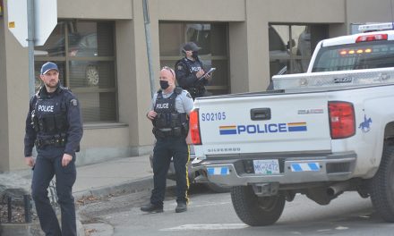 Police arrest two suspects outside bank