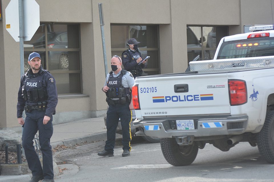 Police arrest two suspects outside bank