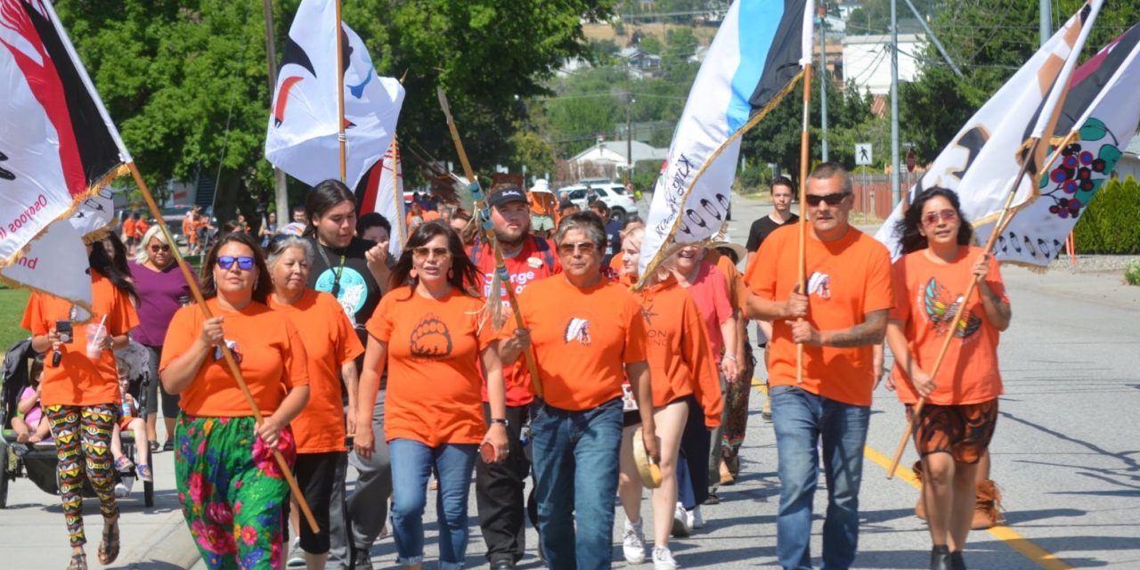 Hundreds walk in solidarity with Osoyoos Indian Band