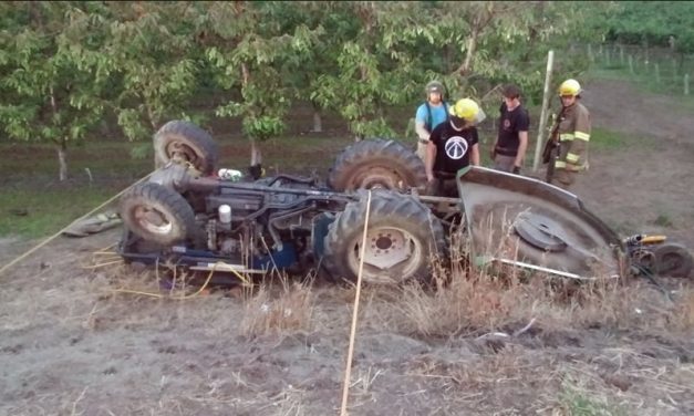 Driver pinned under tractor
