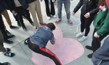 Students promote ‘peace chalks’ in Oliver