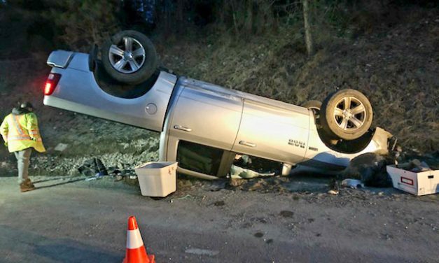 Driver injured after rollover on Anarchist