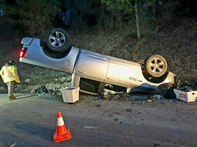 Driver injured after rollover on Anarchist