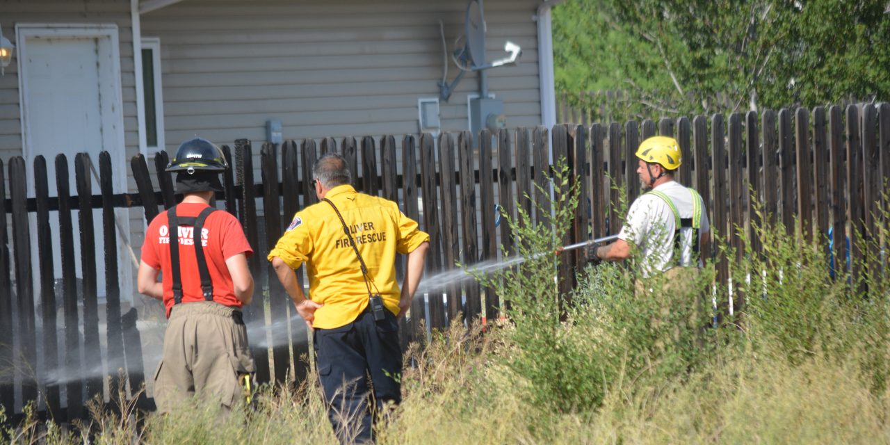 Firefighters jump on riding mower blaze